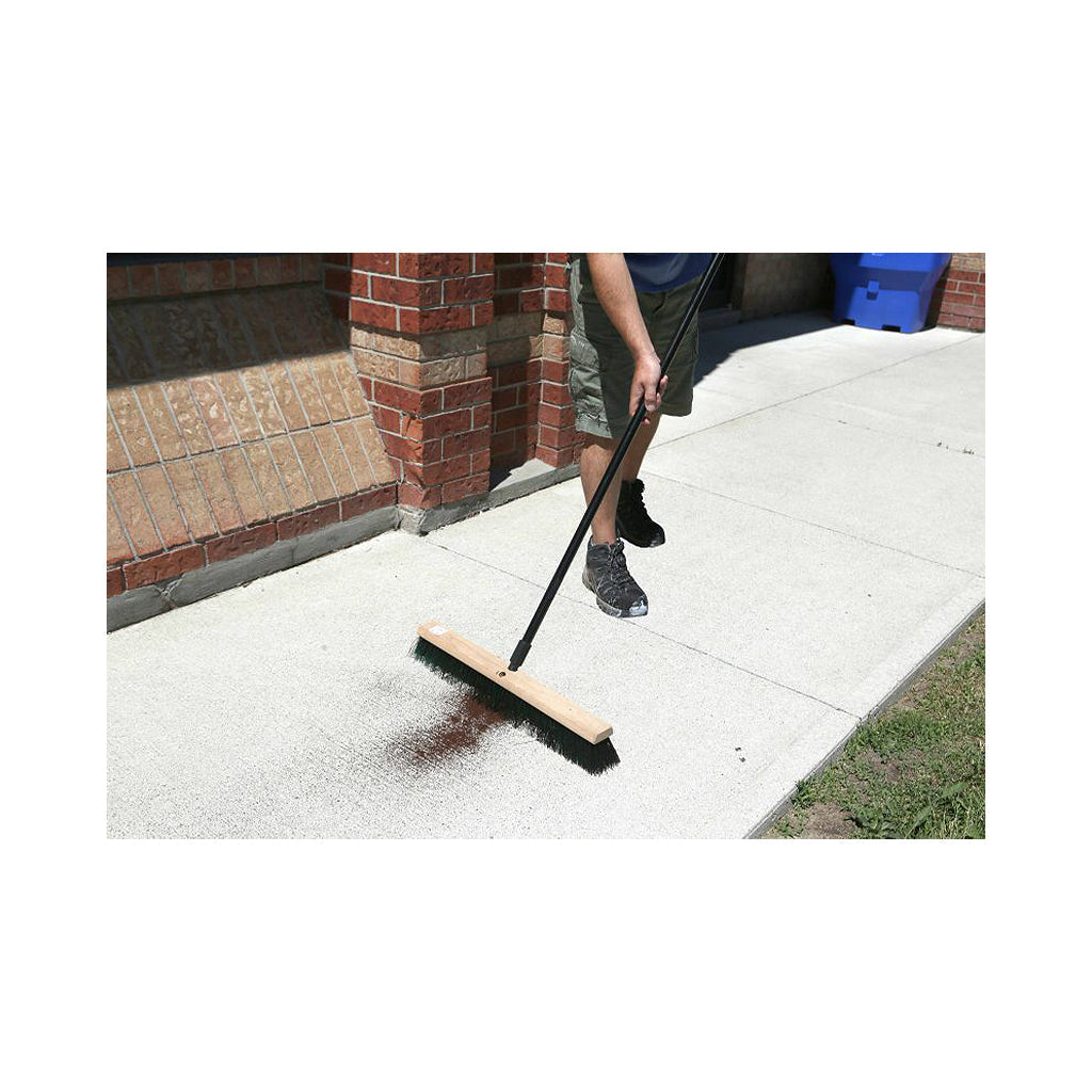 man using natural wood block broom brush with black and green brissels to clean outdoor pathway, Side-Clipped Pathfinder Rough Push Broom Head, SIZE, 18 Inch, FLOOR CLEANING, PUSH BROOMS, 4484,4485